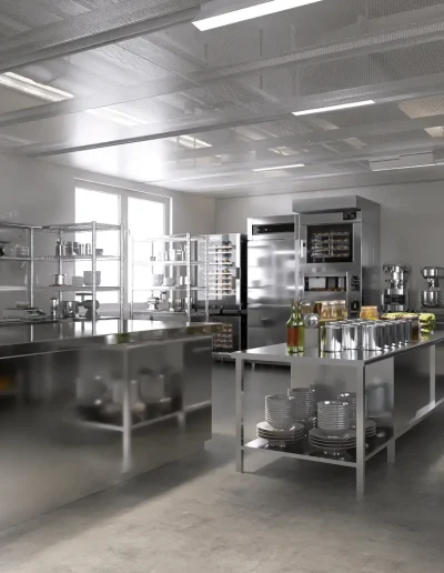 Modern commercial kitchen with stainless steel countertops, professional ovens, mixers, and open shelving. Bright, clean workspace designed for food preparation and catering.